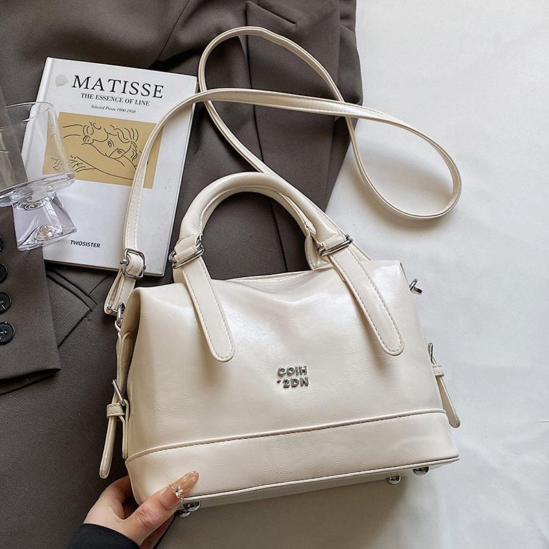 Korean Retro Simple Soft Leather Portable Pillow Bag Wholesale Explosion Leisure Niche Commuting Advanced Sense Messenger Women's Bag