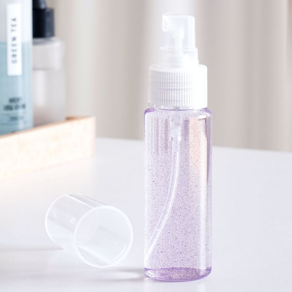 Okrągła butelka ze spryskiwaczem 50 ml