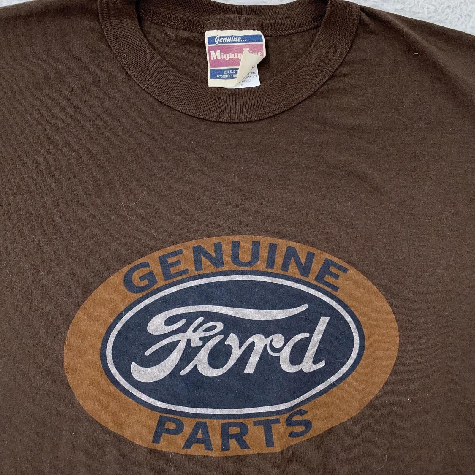 

Vtg Ford Genuine Parts T-Shirt Small Brown Truck Car Racing Tee Logo Mighty Fine 4XL