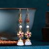 Exquisite 925 Sterling Silver Chinese-Style Lotus Earrings with Imitation Jade and Floral Design.