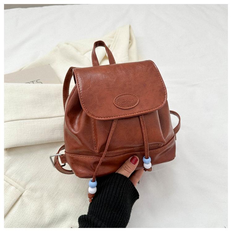 

2025 осень и зима новая маленькая ретро цветовая гамма простой простой модный повседневный наплечный мессенджер рюкзак коричневый