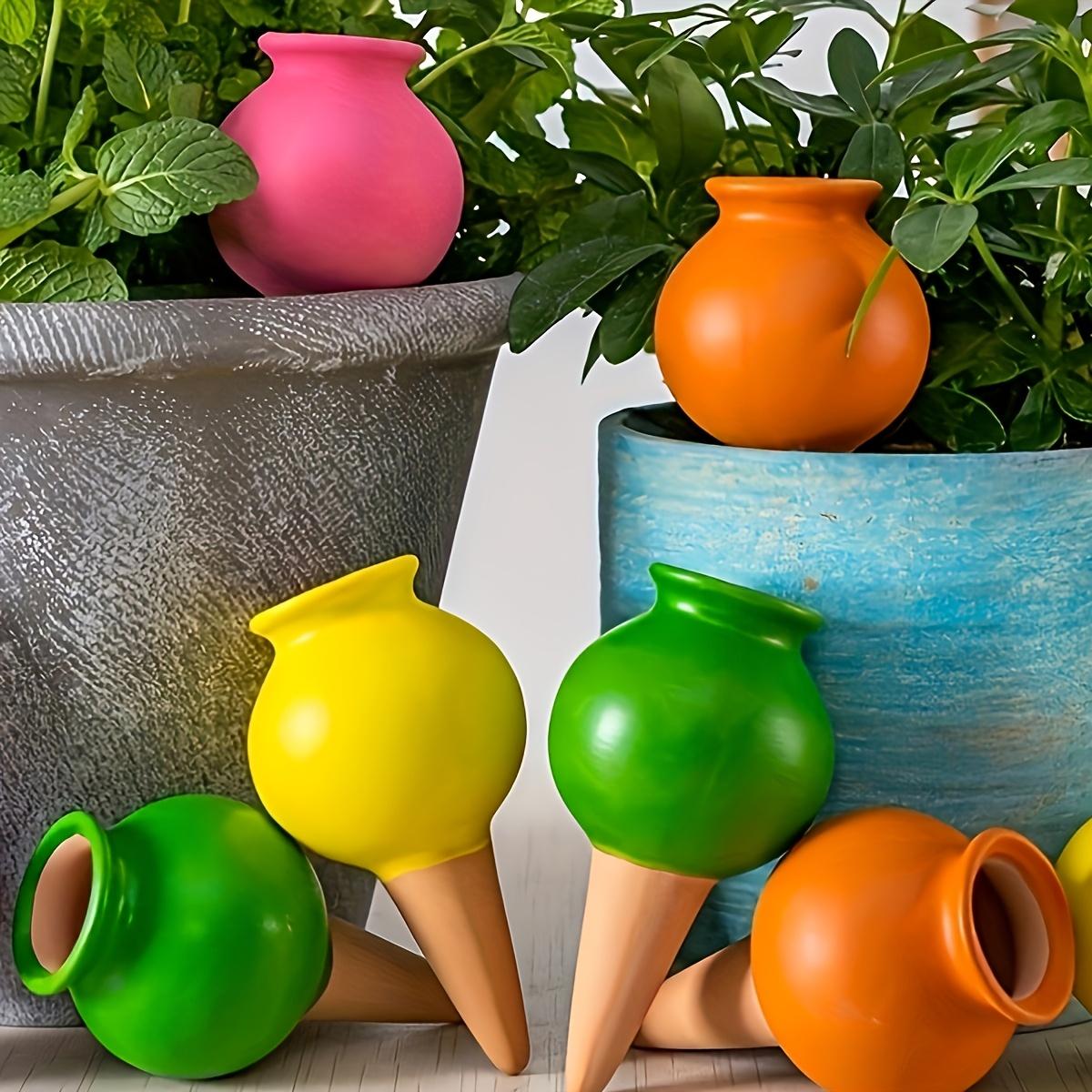 

Artistic Ceramic Watering Spikes, 4pcs Mixed-Color Auto Drip Irrigation for Indoor/Outdoor Plants & Succulents. Playful Design.