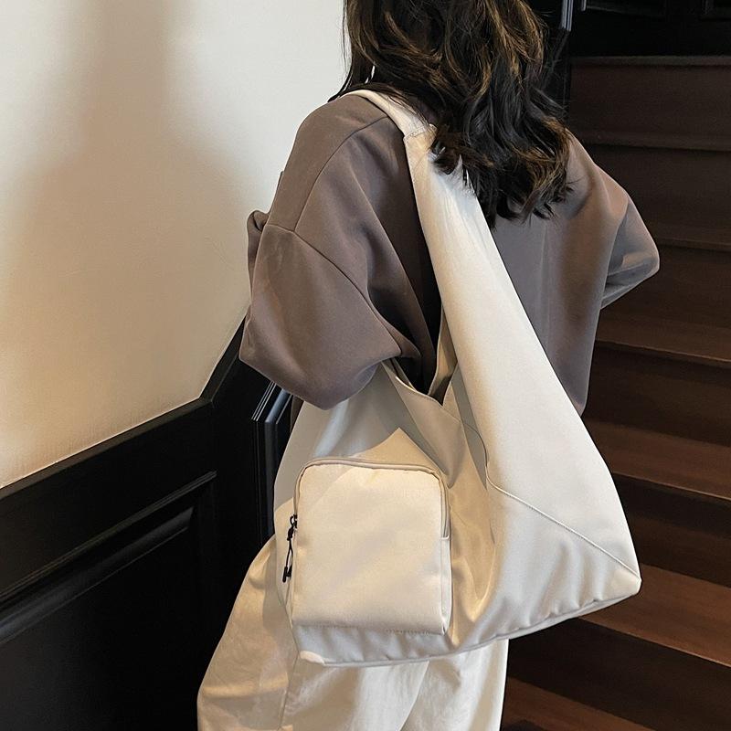Japanese simple handbag bag women's 2025 new large-capacity niche design casual crossbody bag commuter tote bag