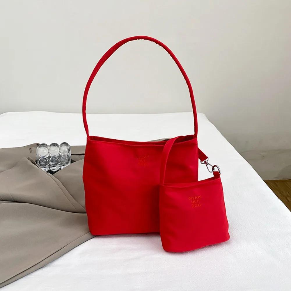Koreanischer Stil Nylon-Tragetasche Handtasche Große Kapazität Stickerei Buchstabe Achseltasche All-Match Unifarbene Stoff-Umhängetasche Reise
