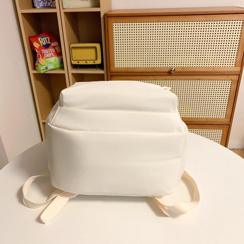 Soft waxy milk yellow backpack female simple versatile ins large capacity high school student junior high school student schoolbag backpack