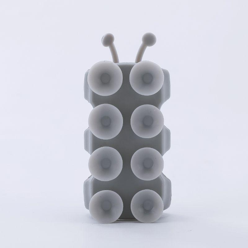 Uchwyt na słuchawkę prysznicową Caterpillar z przyssawką, bez wiercenia, z kreatywnym designem z miejscem na karty