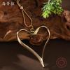 New hollow exaggerated love long necklace, women's hollow heart-shaped versatile long pendant