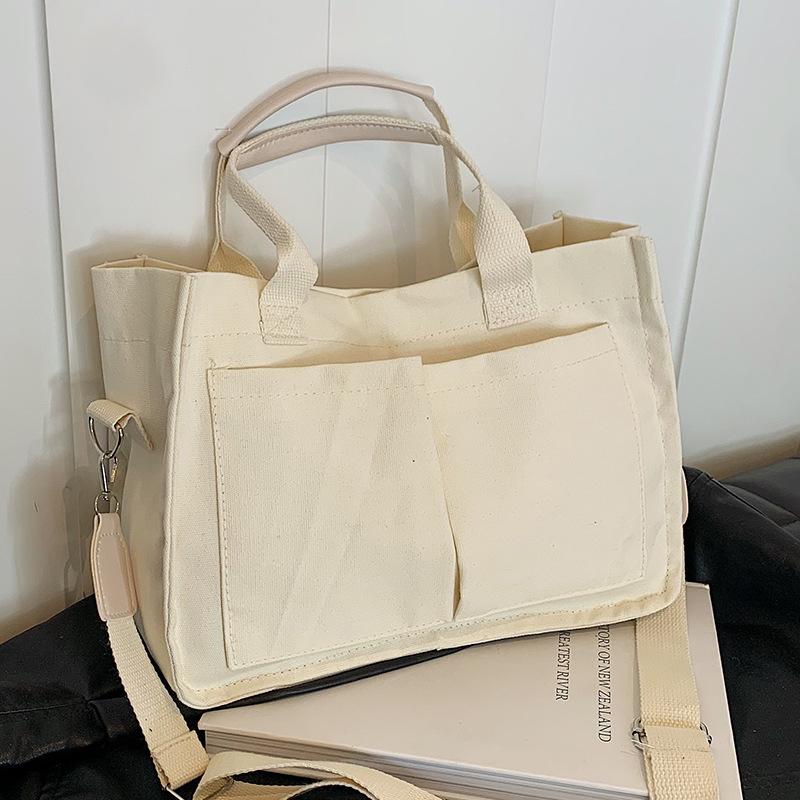 Large Capacity Commuting Tote Bag New Niche Canvas Bag Women's Retro One-shoulder Handbag Simple Crossbody Bag
