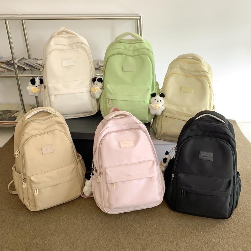 Solid color female Harajuku backpack, campus style, junior high school, high school student schoolbag, female simple large-capacity backpack