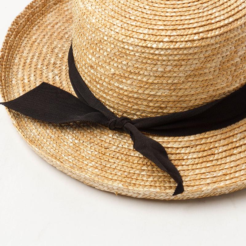 Spring and summer new bow decoration children's wide brim curled straw straw straw hat outdoor travel sun protection straw hat
