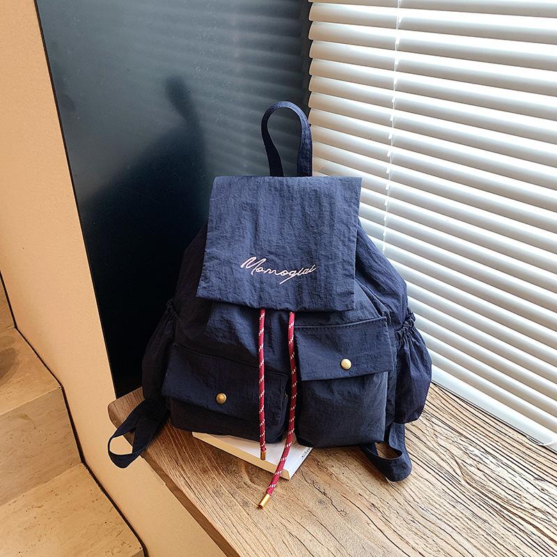 New Korean version of student schoolbag women's high-value commuter travel bag solid color large-capacity casual backpack women