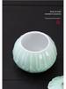 Celadon Ceramic Tea Canister: Large Half-Pound Capacity Storage for Green or Black Tea - Porcelain Sealing Jar with Printed Design.