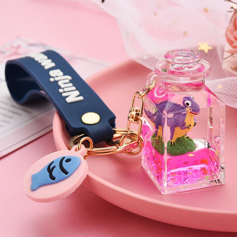Creative Quicksand Little Yellow Duck Dinosaur Perfume Bottle Backpack Pendant Acrylic Accessory