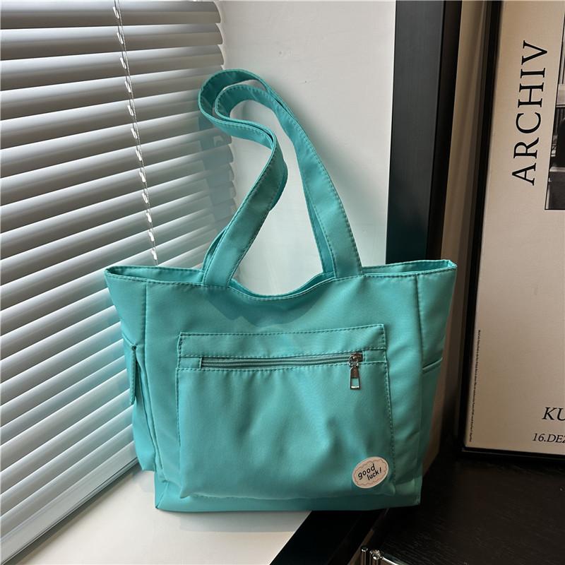 

Lazy literary cloth bag solid color casual college student class commuting versatile large capacity portable shoulder armpit bag female