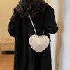 Niche design mini bag women's 2025 new fashion solid color love headphone bag crossbody change lipstick bag