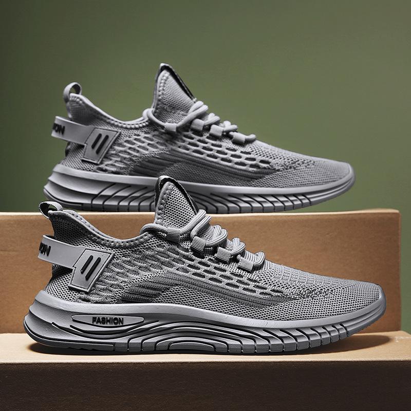 

Чоловічі дихаючі повсякденні туфлі з сітчастого fly-knit, модні, легкі та зручні спортивні туфлі, трендові універсальні дорожні туфлі в корейському стилі 44 сірий колір