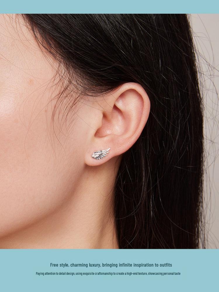 Silver Ziyun Original S925 Angel Wing Earrings with Inlaid Zircon - Unisex Retro Design.