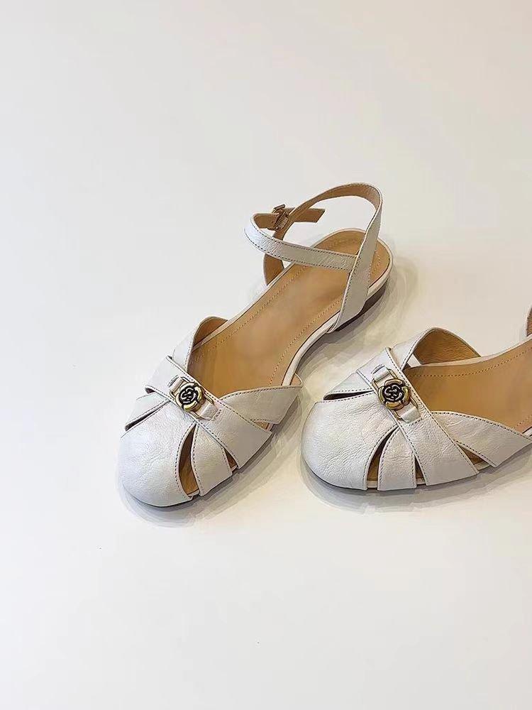 

Soft leather version~ 2025 new French hollow one-word sandals women s round head versatile retro camellia Roman shoes 40