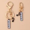 Niedlicher Emaille Mini-Klavier Schlüsselanhänger Simulation Musikinstrumente Schlüsselring Anhänger Damen Mädchen Handtaschen Dekoration DIY Schmuck Geschenk