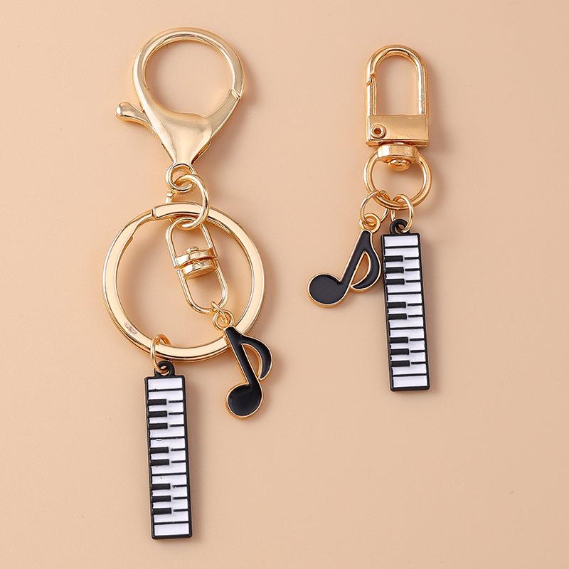 Niedlicher Emaille Mini-Klavier Schlüsselanhänger Simulation Musikinstrumente Schlüsselring Anhänger Damen Mädchen Handtaschen Dekoration DIY Schmuck Geschenk