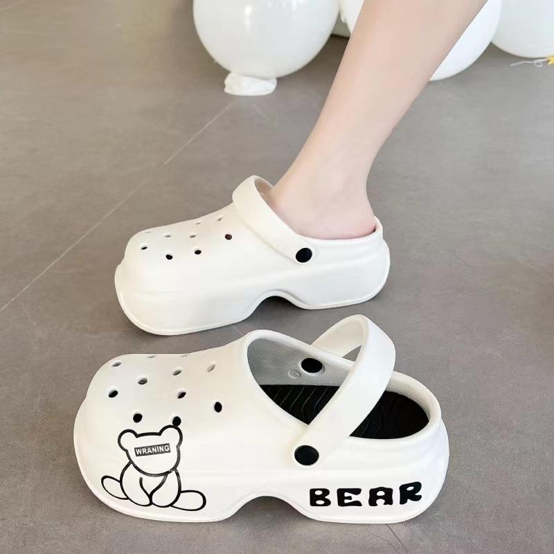 New thick-soled hole shoes women's summer outer wear bag head printing cartoon beach stepping on shit high-heeled cool slippers