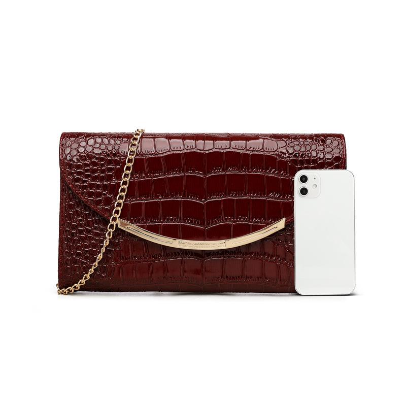 O geantă de seară tip clutch scurtă la modă cu compartimente multiple și un portmoneu pentru monede