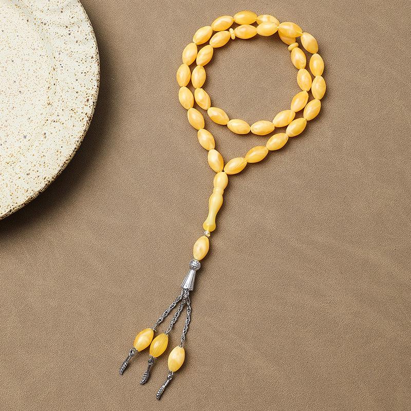 

Ручной работы 33-бусинный тасбих молитвенный браслет из Саудовской Аравии жёлтый