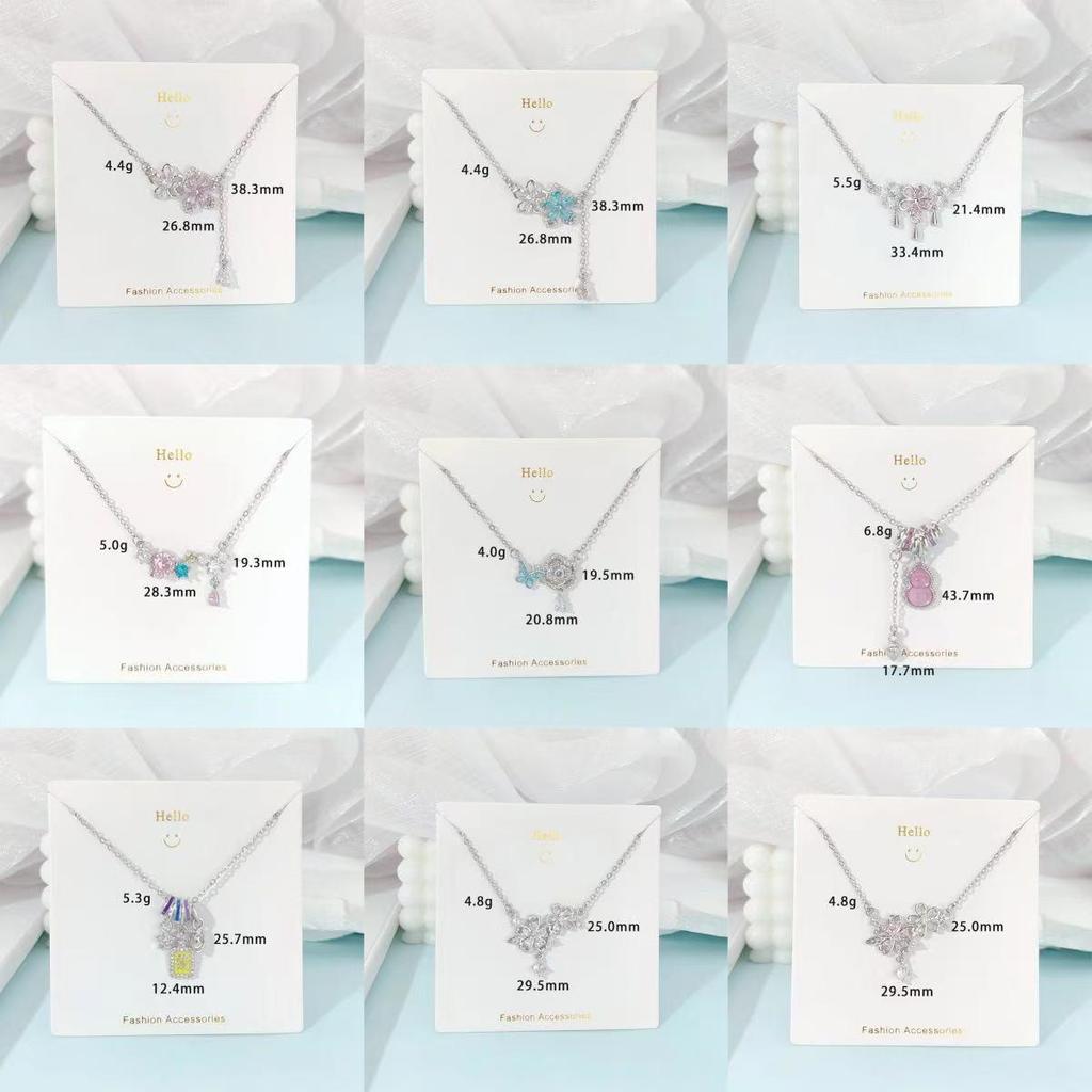 Pink Zircon Gourd Pendant Necklace with Floral Tassels - Titanium Steel Clavicle Chain for Women's Light Luxury.