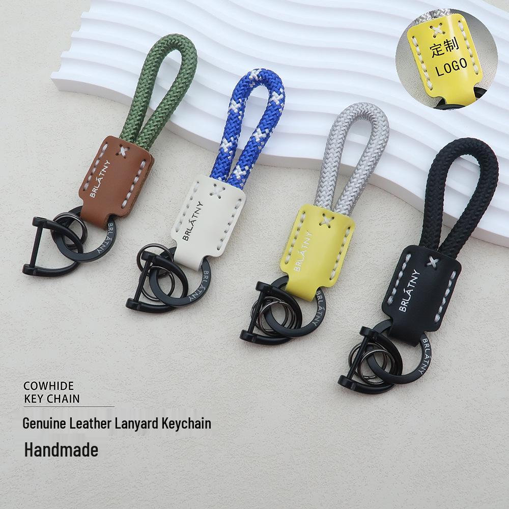 Hand-Woven Cowhide Leather Keychain Pendant with Logo Embossing - High-Quality Anti-Lost Car Lanyard