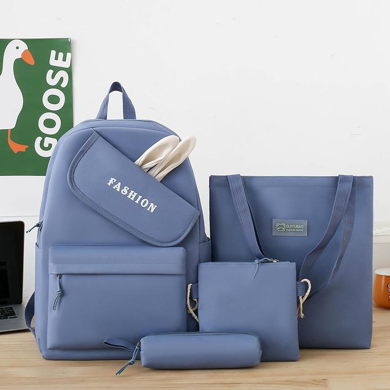New girl backpack, primary and secondary school schoolbag, make-up bag, four-piece rabbit ear class backpack