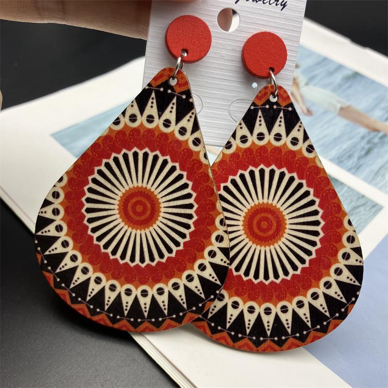 Bohemian Ethnic Peacock Feather Pattern Wooden Earrings for Women Vintage Long Hollow Water Drop Earring Vacation Casual Jewelry