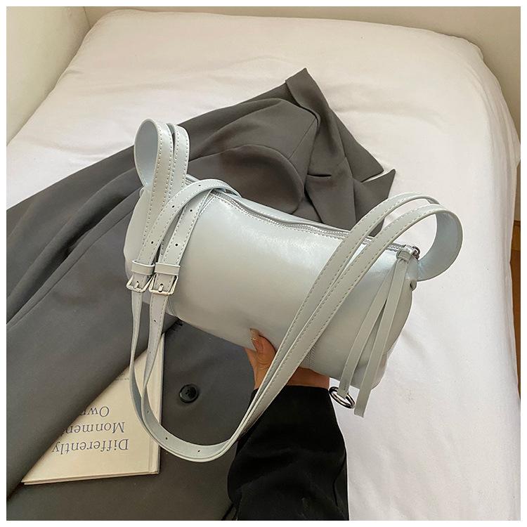 

Premium cylinder shoulder women s bag new oil wax leather fashion messenger bag retro niche design pillow bag tide синий