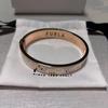 Used FURLA arch bangle