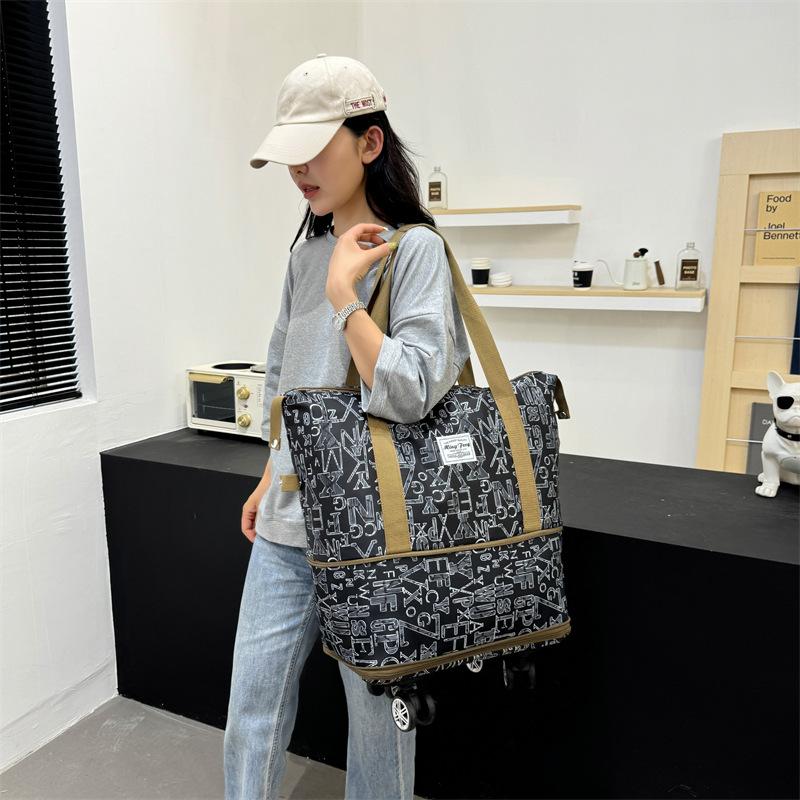 Double-layer expansion with wheels, large-capacity portable travel bag, wet and dry separation, personalized fitness bag can be set with tie rod.