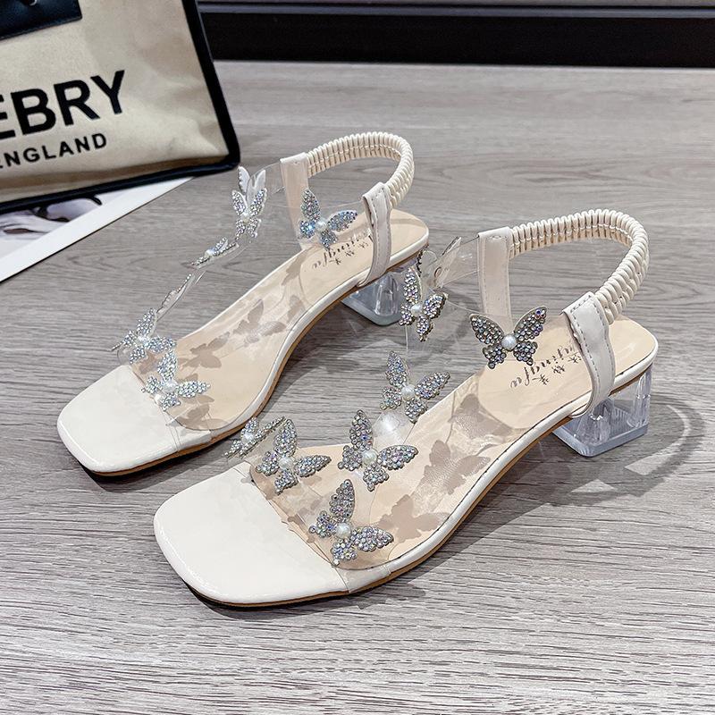 Sandalen Damen 2025 Sommer neu Römisch elastisches Band Strass Feenstil Mode transparent dicker Absatz Kristall hohe Absätze