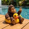 Small Collectible Ornament Sasquatch And Duck Figurine, on Swimming Ring Statue, Lifelike Resin Statue Funny Animal for Home Tabletop Shelf