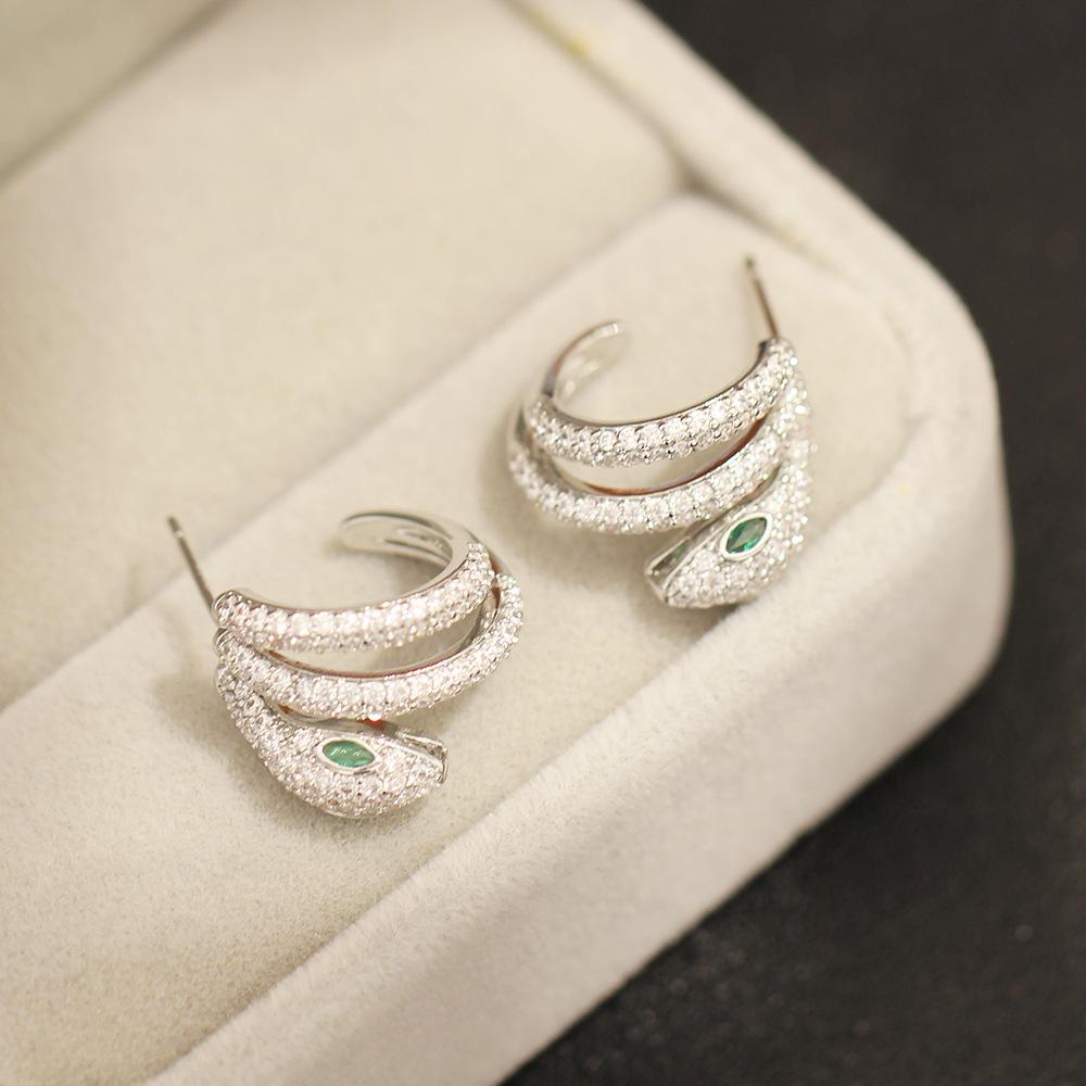 European and American niche, stone-inlaid, exquisite gold and silver two-color snake earrings, gilded, versatile, silver needle, zodiac animals, studs