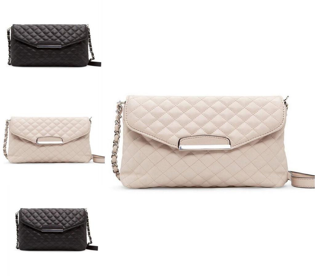 Versatile Women's Leather Clutch Handbag With Classic Appeal And Adjustable Strap