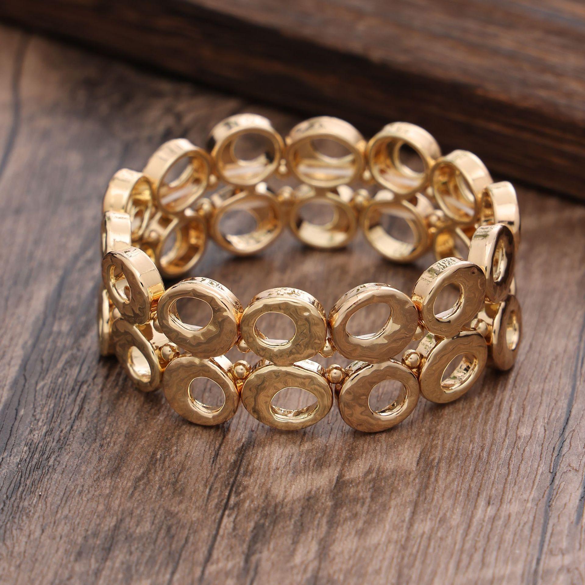 

Round hollow two-row splicing elastic bracelet, electroplated gold and silver personalized men s and women s versatile bracelet Elastic Adjustable