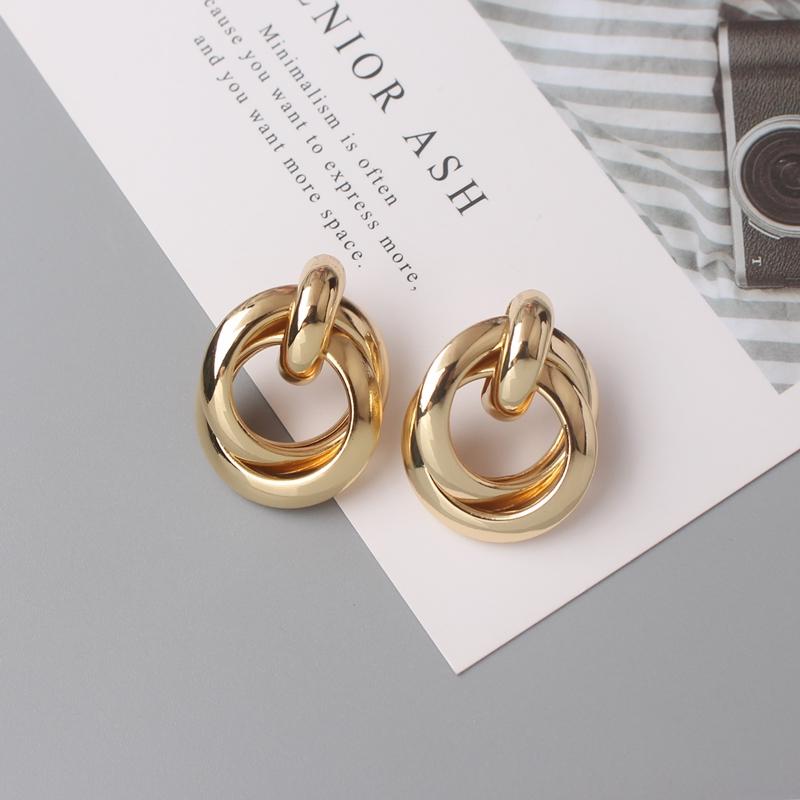 Przesadna geometria Nieregularne metalowe wiszące kolczyki Spiralny skręcony węzeł Okrągłe gładkie Brincos Cyrkonia