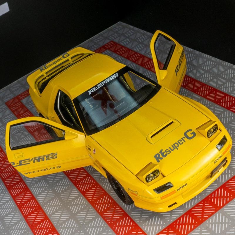 Simulation RX-7 Alloy Car Model Ornaments Acousto-optic Four-door Steering Shock-absorbing Toy Car