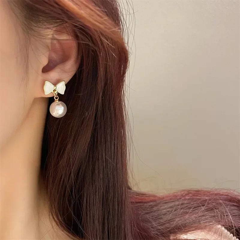 Cute Romantic Bowknot Pearl Earrings for Women Korean Simple Personality Exquisite Pendant Earrings Wedding Jewelry Party Gift