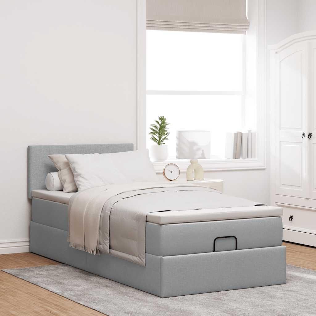 Enjoy restful nights with this ottoman bed with mattress in light grey measuring 80 x 200 cm upholstered in fabric