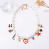 Baroque simple and fashionable imitation pearl alloy dripping oil love heart cherry and other multi-pendant necklace