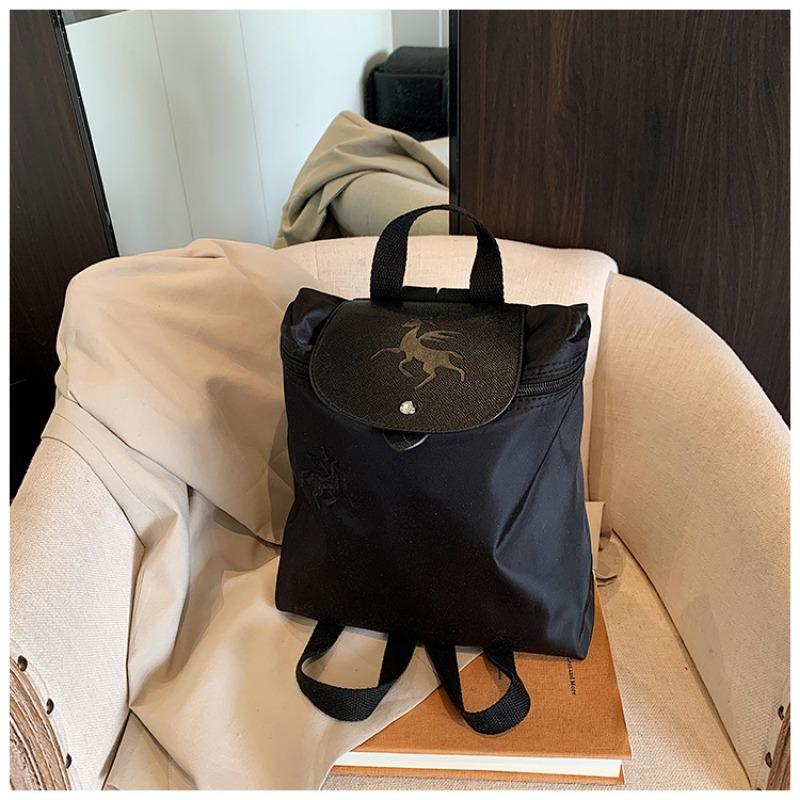 

Tide commuter bag female college student casual backpack embroidery color matching foldable portable oblique span backpack female чорний