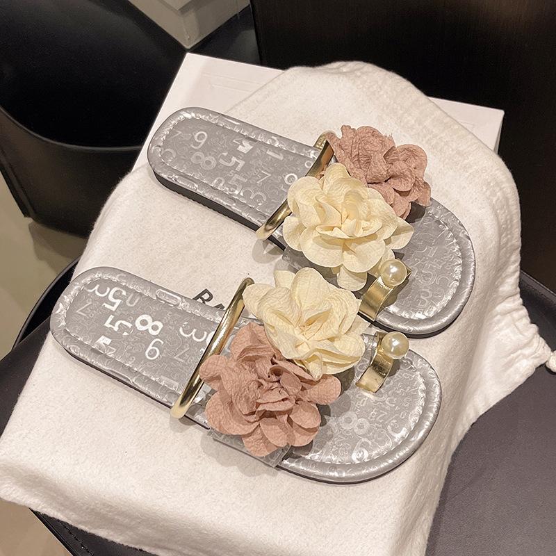 2025 summer new open-toed flower casual beach women's cool slippers low-heeled flat bottom women's high-end sense