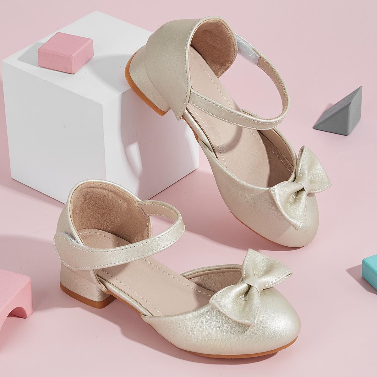 

2025 Новые женские туфли на высоком каблуке: Стильные сандалии с вырезами и бантом для возраста 7-12 лет 29 золотой