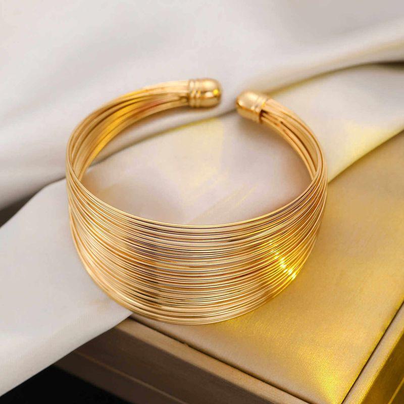 

Fashion Exotic Multi-Layer Metallic Yarn Bracelet Fashion Sense Metallic Golden Open-End Multi-Circle Ol Wide Bracelet Gold