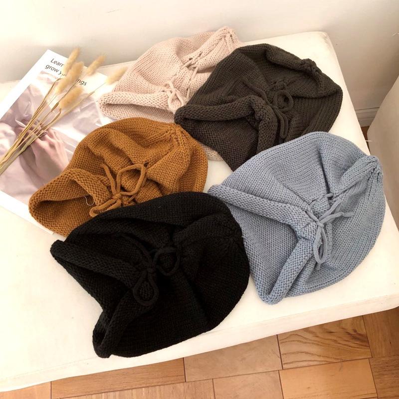 Autumn and winter solid color warm crimped wool hat men's and women's versatile knitted hat fashion street drawstring stacking hat