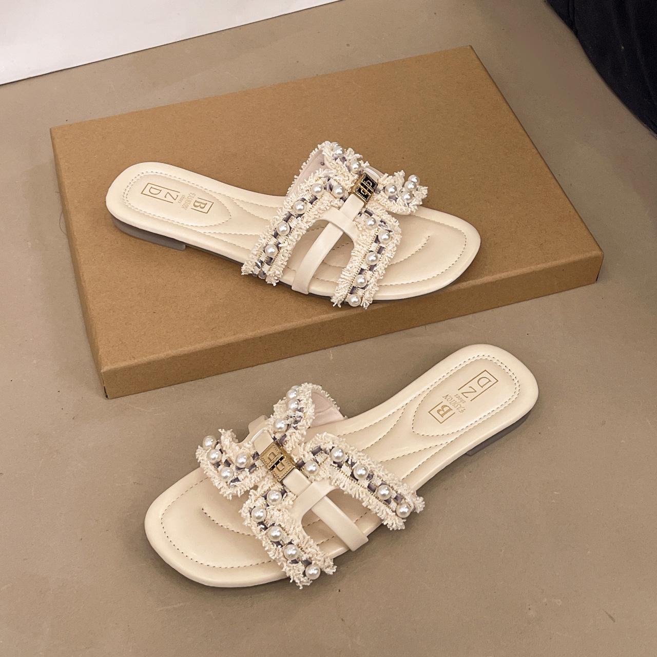 

2025 summer new Xiaoxiangfeng flat-bottomed slippers women wear spring soft-bottomed fairy versatile pearl beach sandals 40 синий
